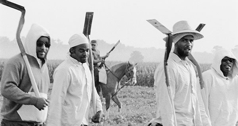 Chandra McCormick. Men Going to Work in the Fields of Angola, 2004. Archival pigment print. Courtesy of the artist. © Chandra McCormick